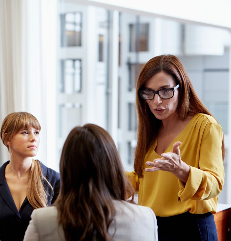 employees engaging in conversation